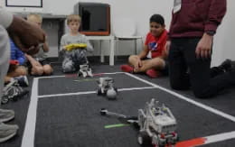 a group of people playing with toys