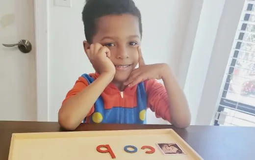 a child with his hands on his face