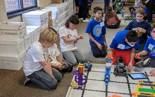 a group of children playing with toys