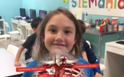 a girl smiling at the camera