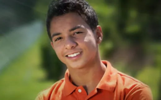 a person smiling for the camera