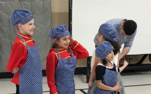 a group of children in clothing
