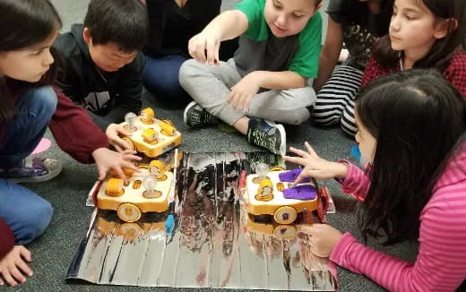 a group of children playing with toys