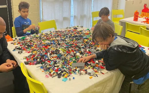 a group of people playing a board game