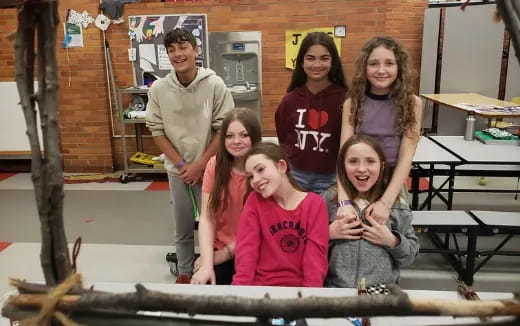 a group of people posing for a photo