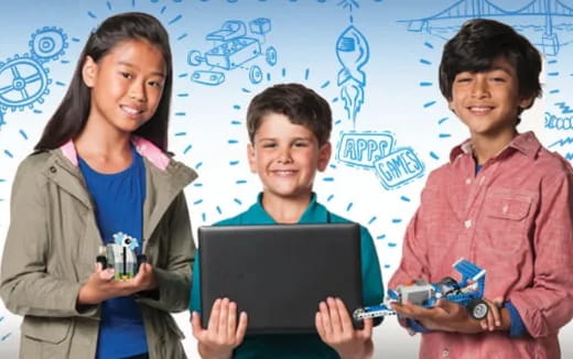 a group of people holding objects