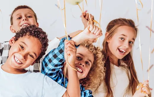 a group of people holding a rope