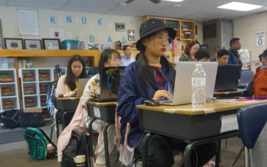 a group of people in a classroom