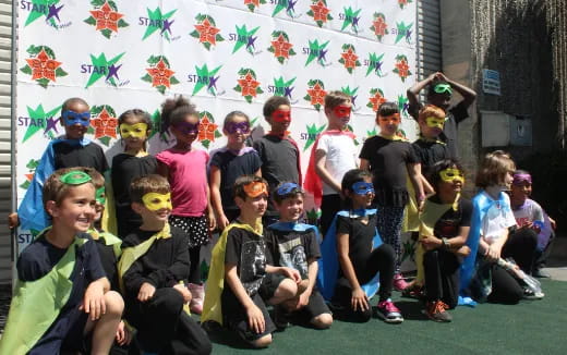a group of people wearing masks