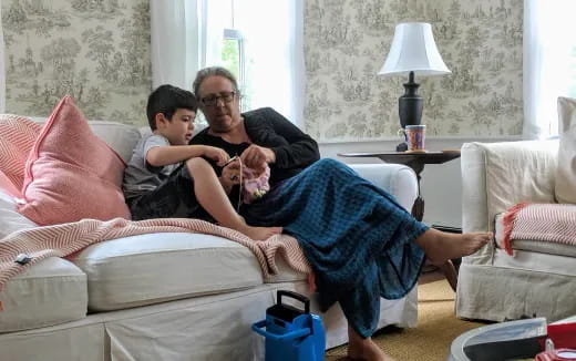 a man and a woman sitting on a couch