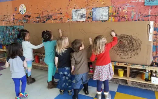 a group of children in a classroom