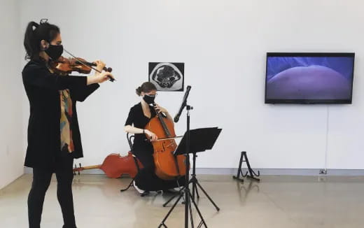 a couple of people playing instruments
