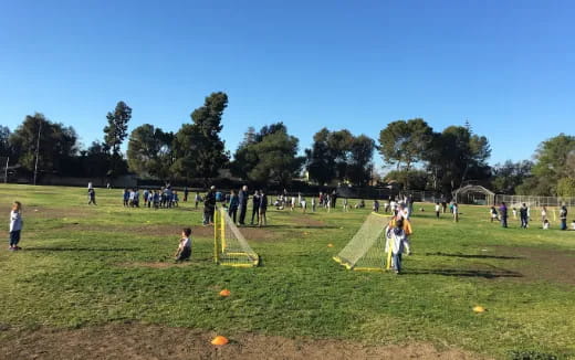 a group of people playing football