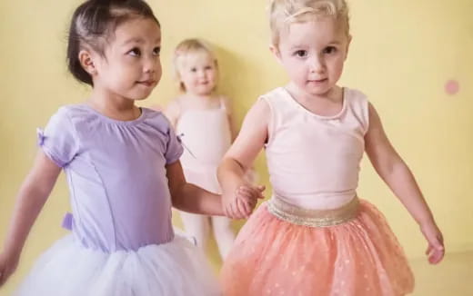a group of children posing for the camera