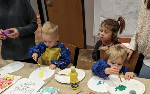 a group of kids eating cake