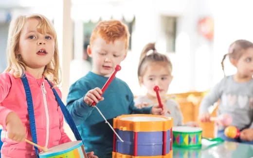 a group of children playing with toys