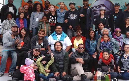 a group of people posing for a photo