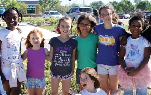 a group of people posing for a photo