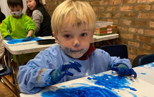 a boy with a face paint
