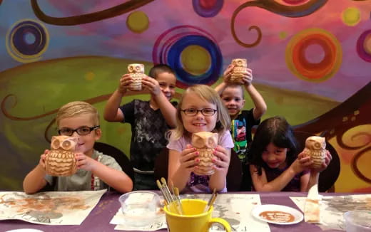 a group of kids holding ice cream cones