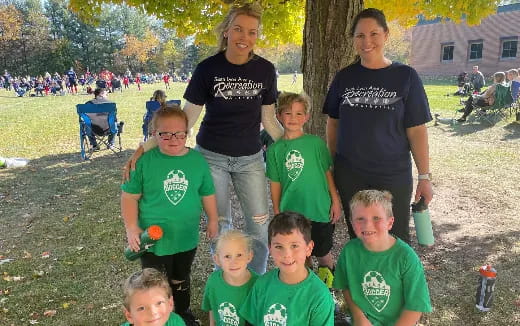 a group of people posing for a photo