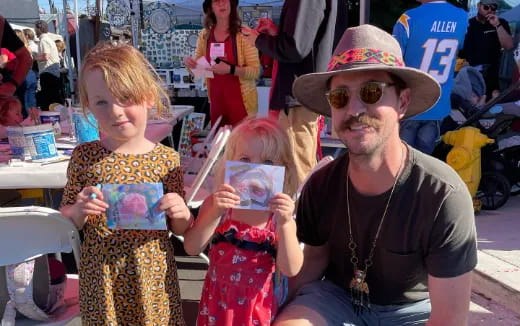 a person and a couple of children