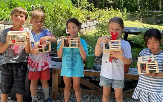 a group of children holding cups