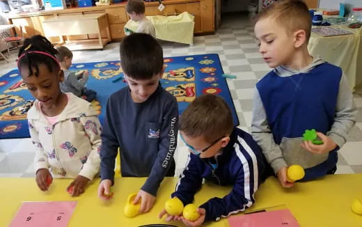 a group of children sitting on the floor