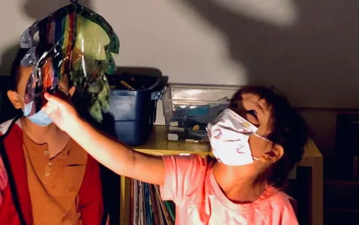 a person with a mask on the face