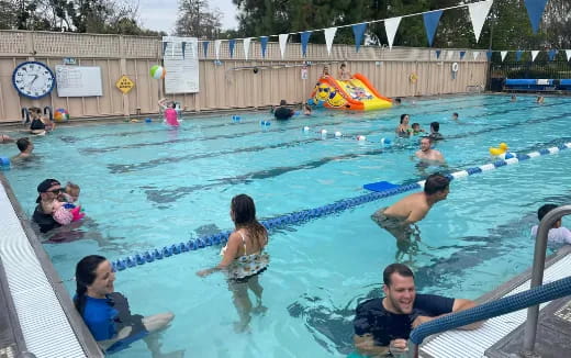 a group of people in a pool