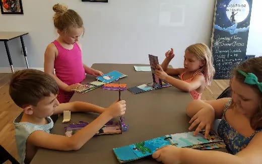 a group of children playing with toys