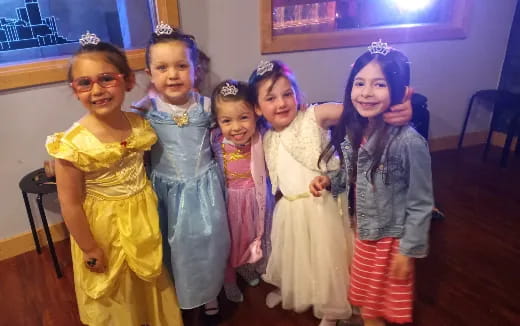 a group of children in clothing