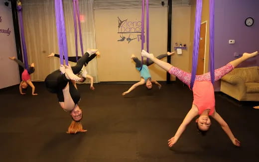 a group of people doing yoga