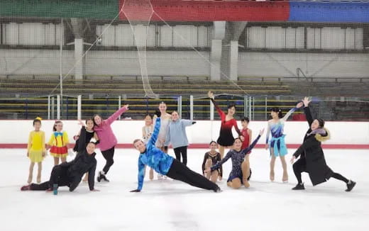 a group of people ice skating