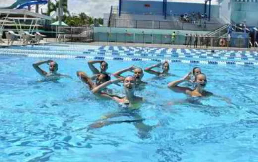 a group of people in a pool
