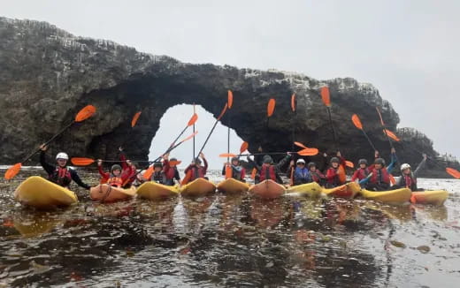 a group of people in a raft