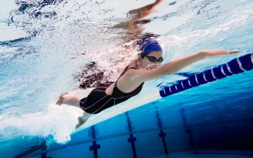 a person swimming in a pool