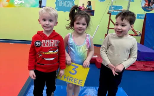 a group of children posing for a photo