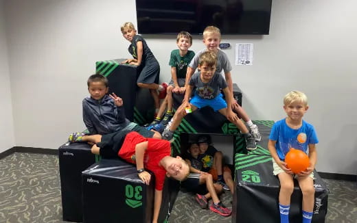 a group of kids sitting on a couch