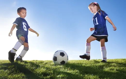 a couple of kids playing football
