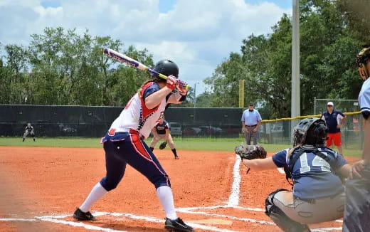 a baseball player swinging a bat