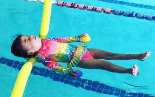 a person in a pool