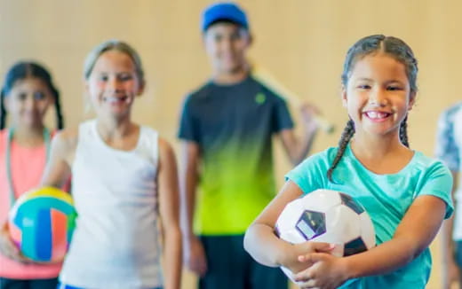 a group of people holding a ball