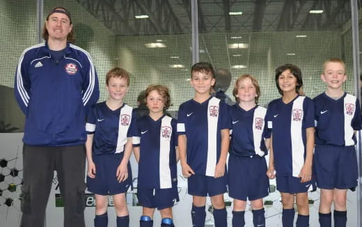 a group of people in sports uniforms