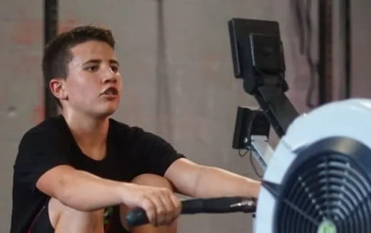a man exercising with a weight