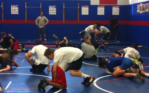 a group of people in a gym