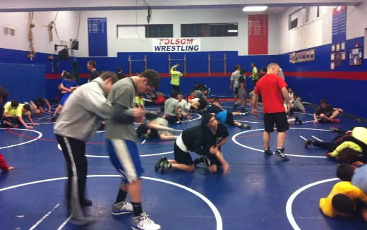 a group of people in a gym