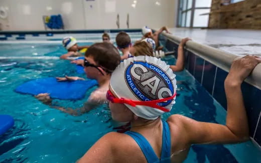 a group of people in a pool