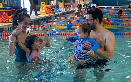 a group of people in a pool