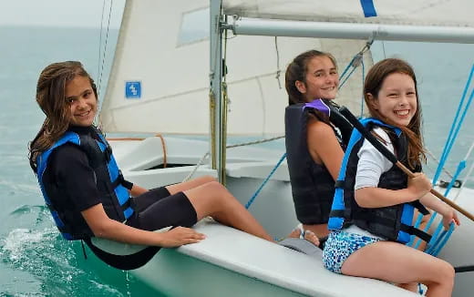 a group of girls on a boat
